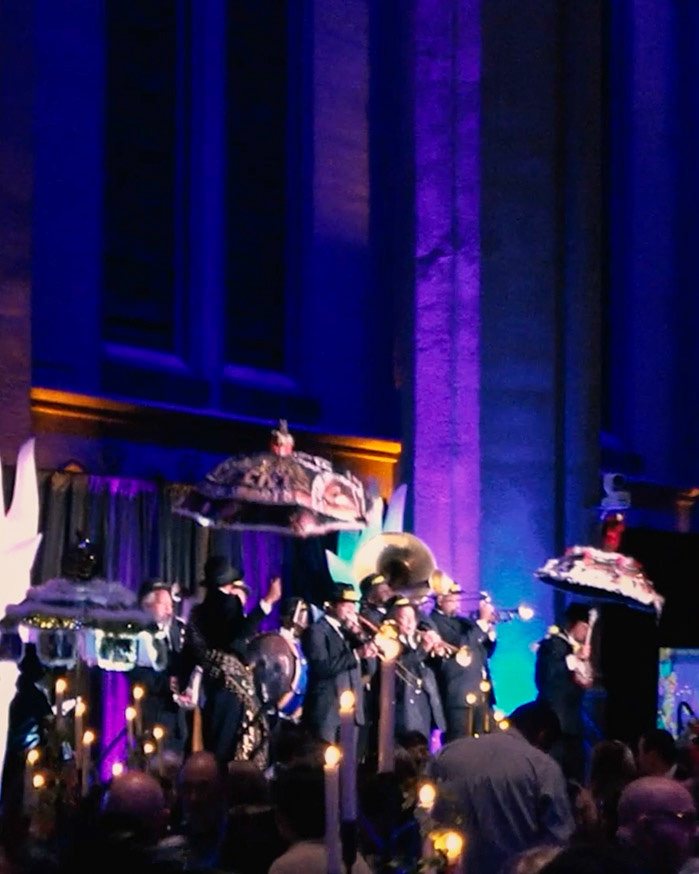 BTG Brass Band performing at a candlelight event